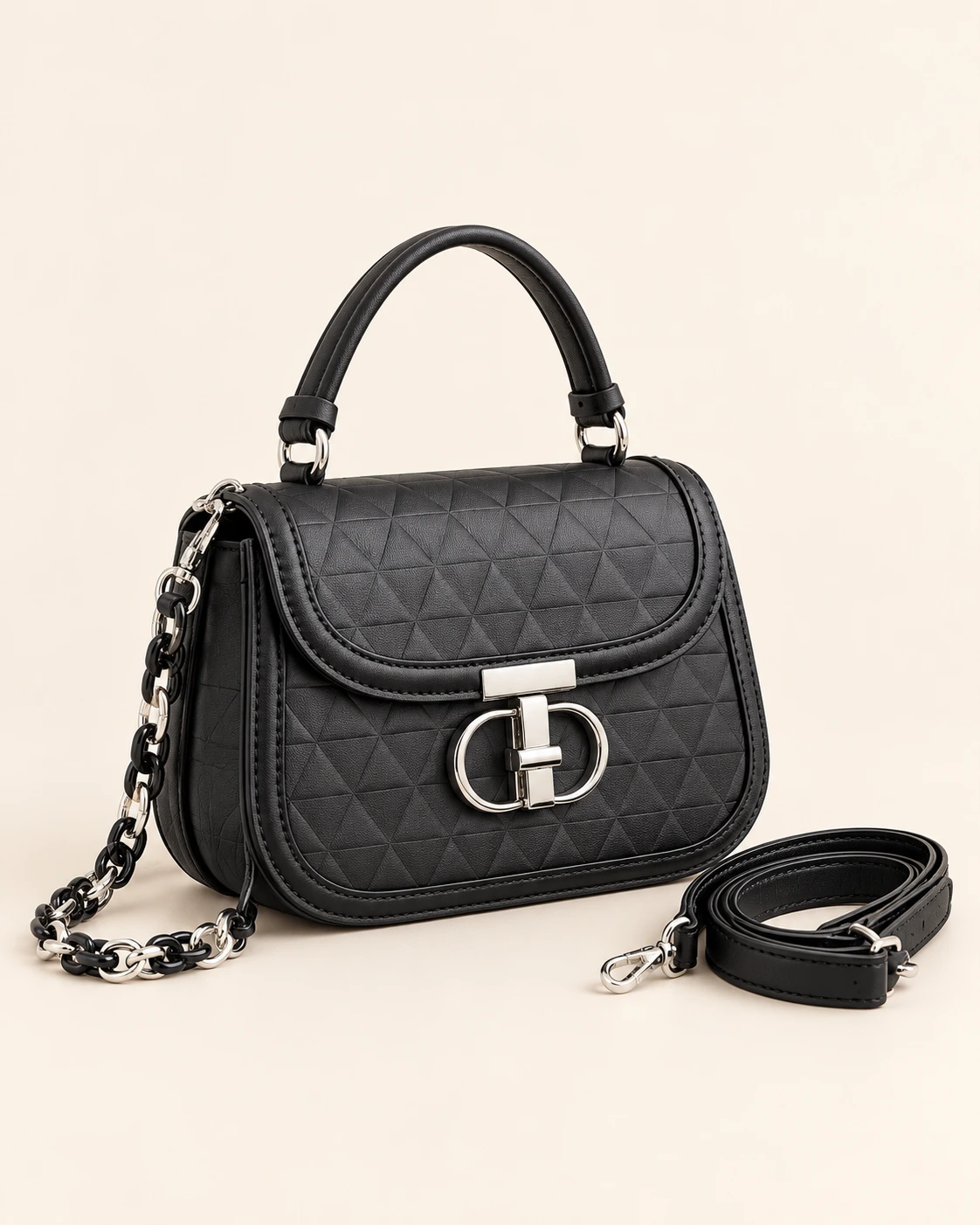 The Anora Noir Geometric Crossbody — catalog photograph